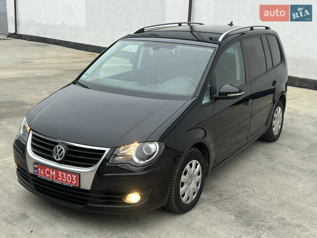 Черный Фольксваген Туран, объемом двигателя 1.4 л и пробегом 213 тыс. км за 8100 $, фото 28 на Automoto.ua