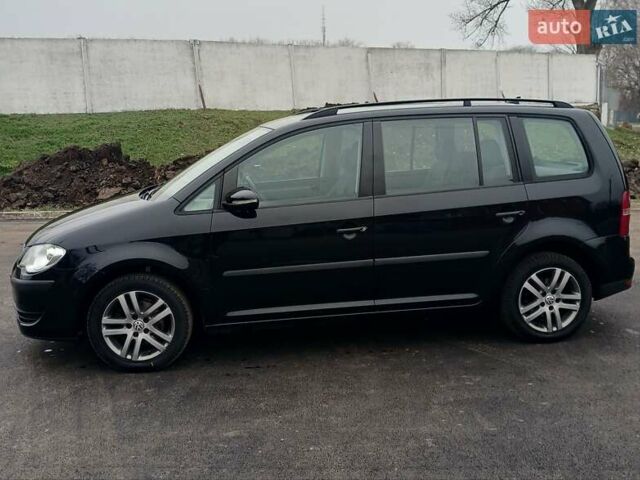 Черный Фольксваген Туран, объемом двигателя 1.6 л и пробегом 249 тыс. км за 7999 $, фото 9 на Automoto.ua