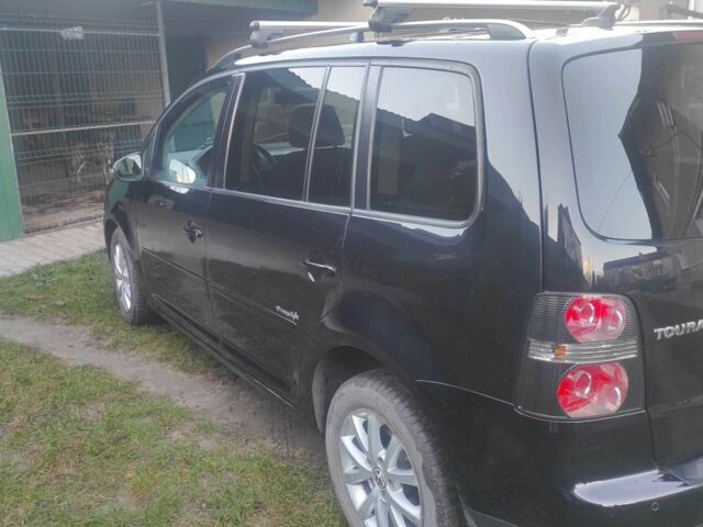 Чорний Фольксваген Туран, об'ємом двигуна 0 л та пробігом 207 тис. км за 8352 $, фото 4 на Automoto.ua