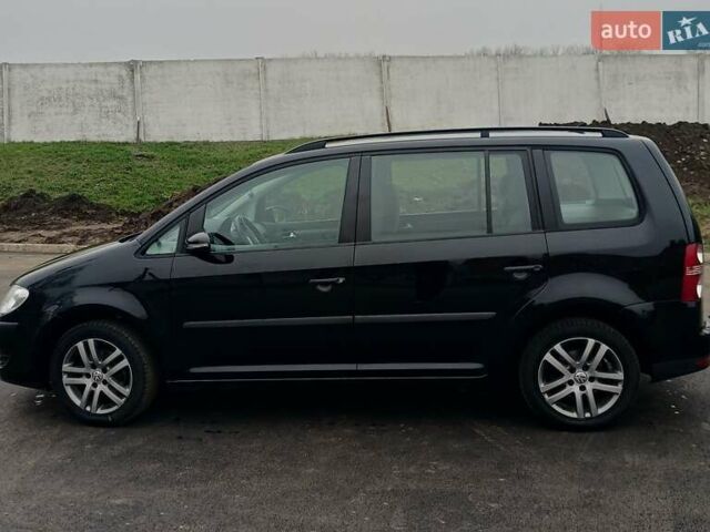 Черный Фольксваген Туран, объемом двигателя 1.6 л и пробегом 249 тыс. км за 7999 $, фото 10 на Automoto.ua