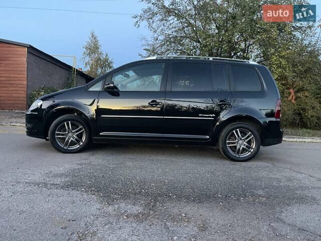 Черный Фольксваген Туран, объемом двигателя 1.4 л и пробегом 238 тыс. км за 7888 $, фото 213 на Automoto.ua