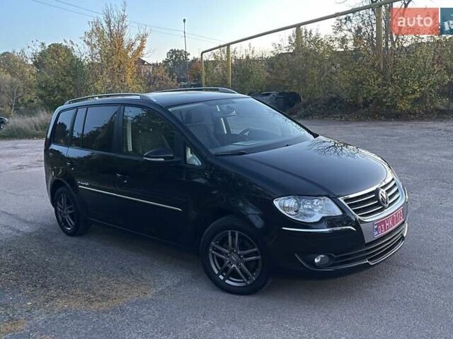 Черный Фольксваген Туран, объемом двигателя 1.4 л и пробегом 238 тыс. км за 7888 $, фото 220 на Automoto.ua