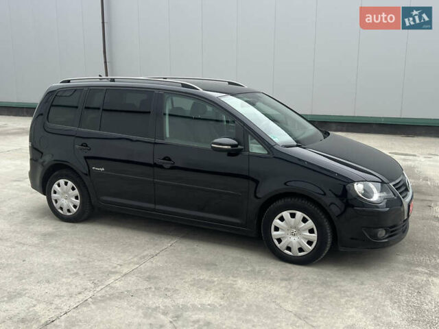 Черный Фольксваген Туран, объемом двигателя 1.4 л и пробегом 213 тыс. км за 8100 $, фото 24 на Automoto.ua