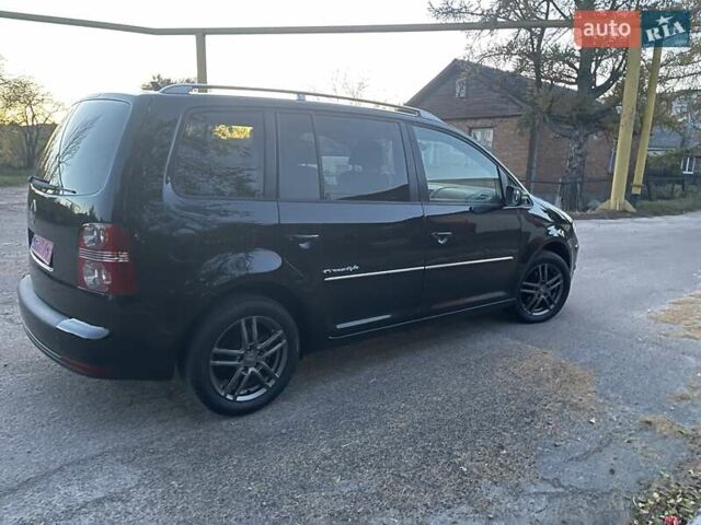 Черный Фольксваген Туран, объемом двигателя 1.4 л и пробегом 238 тыс. км за 7888 $, фото 222 на Automoto.ua