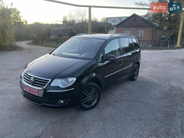 Черный Фольксваген Туран, объемом двигателя 1.4 л и пробегом 238 тыс. км за 7888 $, фото 110 на Automoto.ua