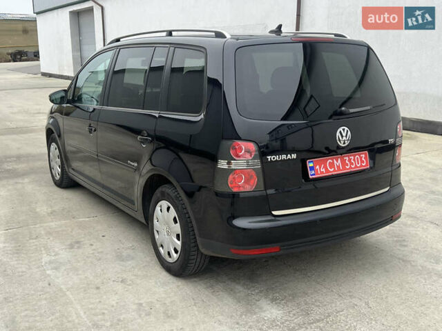 Черный Фольксваген Туран, объемом двигателя 1.4 л и пробегом 213 тыс. км за 8100 $, фото 12 на Automoto.ua
