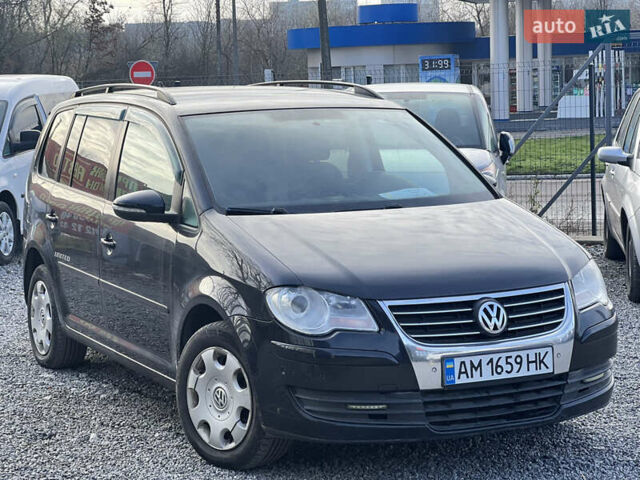Черный Фольксваген Туран, объемом двигателя 1.4 л и пробегом 290 тыс. км за 6900 $, фото 3 на Automoto.ua