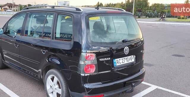 Черный Фольксваген Туран, объемом двигателя 1.39 л и пробегом 195 тыс. км за 8300 $, фото 2 на Automoto.ua