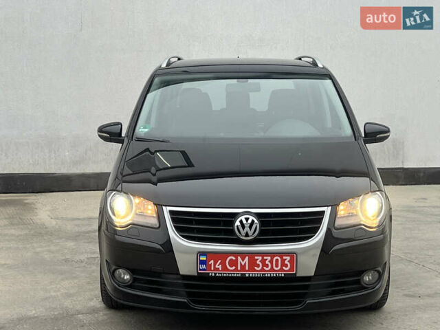 Черный Фольксваген Туран, объемом двигателя 1.4 л и пробегом 213 тыс. км за 8100 $, фото 87 на Automoto.ua