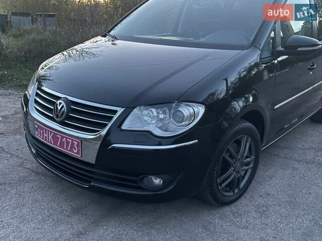 Черный Фольксваген Туран, объемом двигателя 1.4 л и пробегом 238 тыс. км за 7888 $, фото 11 на Automoto.ua