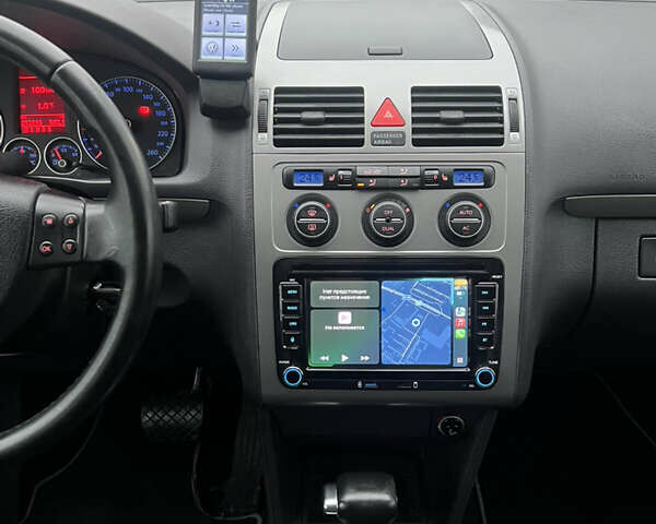 Черный Фольксваген Туран, объемом двигателя 1.4 л и пробегом 213 тыс. км за 7950 $, фото 54 на Automoto.ua