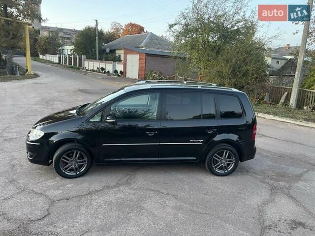 Черный Фольксваген Туран, объемом двигателя 1.4 л и пробегом 238 тыс. км за 7888 $, фото 77 на Automoto.ua