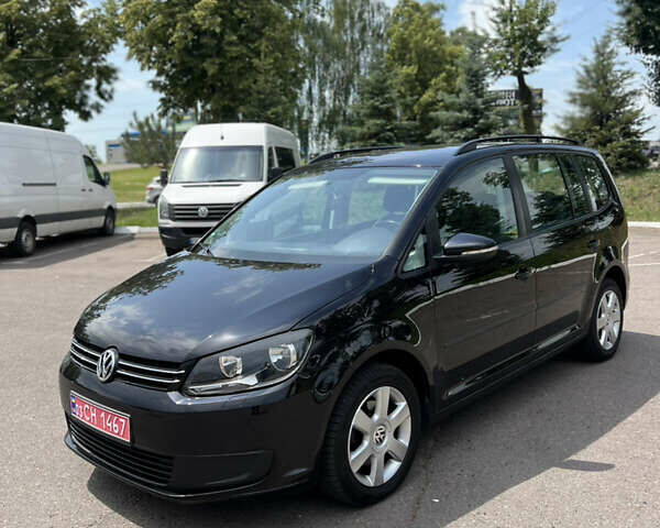 Чорний Фольксваген Туран, об'ємом двигуна 1.6 л та пробігом 256 тис. км за 10900 $, фото 1 на Automoto.ua