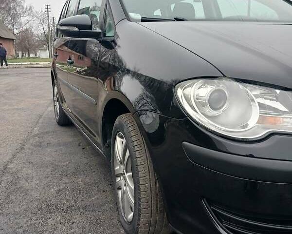 Черный Фольксваген Туран, объемом двигателя 1.6 л и пробегом 249 тыс. км за 7999 $, фото 46 на Automoto.ua