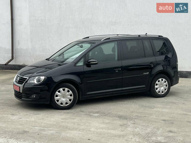 Черный Фольксваген Туран, объемом двигателя 1.4 л и пробегом 213 тыс. км за 8100 $, фото 18 на Automoto.ua