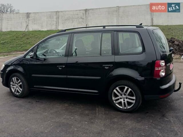 Черный Фольксваген Туран, объемом двигателя 1.6 л и пробегом 249 тыс. км за 7999 $, фото 12 на Automoto.ua