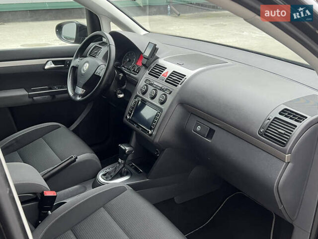 Черный Фольксваген Туран, объемом двигателя 1.4 л и пробегом 213 тыс. км за 8100 $, фото 44 на Automoto.ua