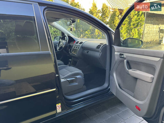 Черный Фольксваген Туран, объемом двигателя 1.4 л и пробегом 199 тыс. км за 7999 $, фото 32 на Automoto.ua