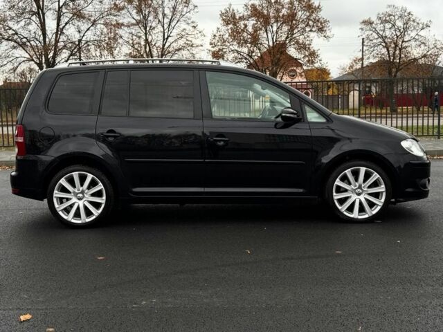 Черный Фольксваген Туран, объемом двигателя 2 л и пробегом 260 тыс. км за 9950 $, фото 4 на Automoto.ua