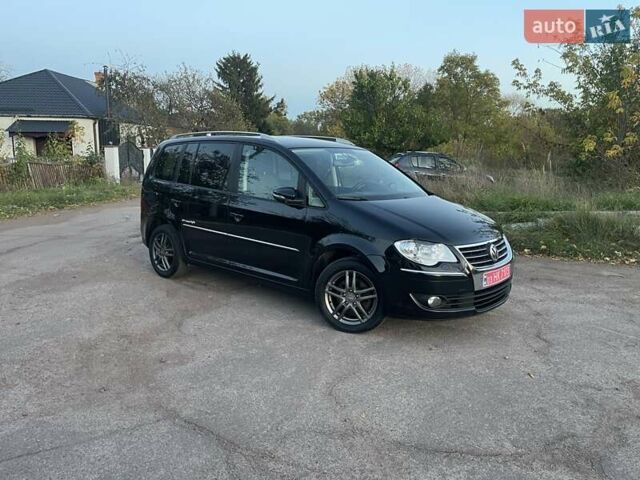 Черный Фольксваген Туран, объемом двигателя 1.4 л и пробегом 238 тыс. км за 7888 $, фото 90 на Automoto.ua