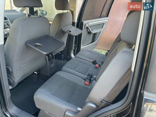 Черный Фольксваген Туран, объемом двигателя 1.4 л и пробегом 238 тыс. км за 7888 $, фото 131 на Automoto.ua