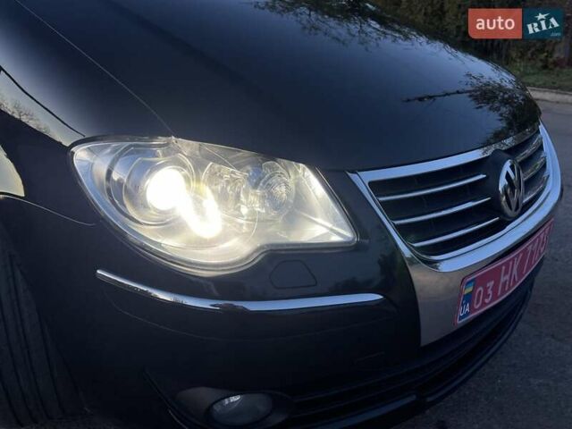 Черный Фольксваген Туран, объемом двигателя 1.4 л и пробегом 238 тыс. км за 7888 $, фото 108 на Automoto.ua