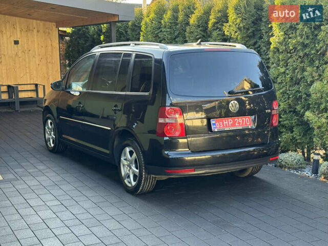 Черный Фольксваген Туран, объемом двигателя 1.4 л и пробегом 199 тыс. км за 7999 $, фото 9 на Automoto.ua