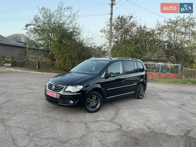 Черный Фольксваген Туран, объемом двигателя 1.4 л и пробегом 238 тыс. км за 7888 $, фото 16 на Automoto.ua