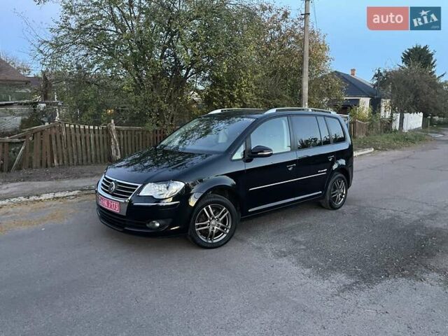 Черный Фольксваген Туран, объемом двигателя 1.4 л и пробегом 238 тыс. км за 7888 $, фото 210 на Automoto.ua