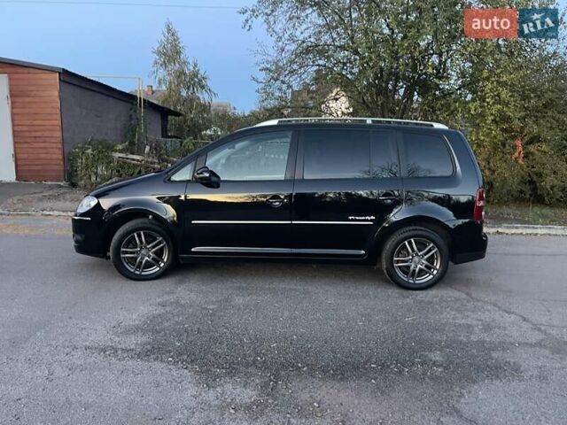 Черный Фольксваген Туран, объемом двигателя 1.4 л и пробегом 238 тыс. км за 7888 $, фото 211 на Automoto.ua