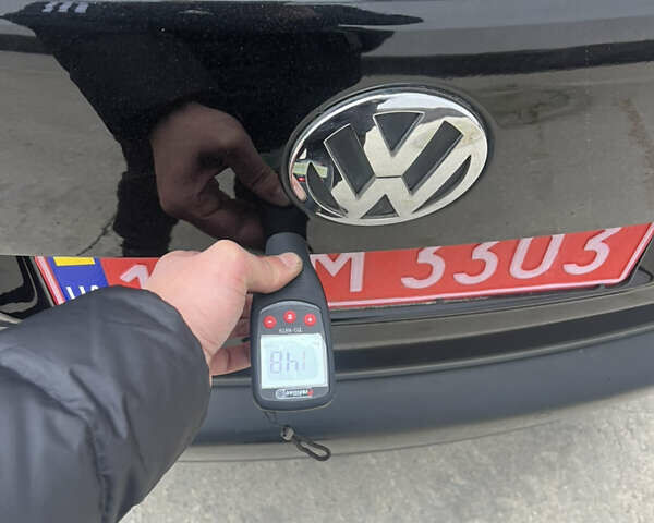 Черный Фольксваген Туран, объемом двигателя 1.4 л и пробегом 213 тыс. км за 8100 $, фото 66 на Automoto.ua