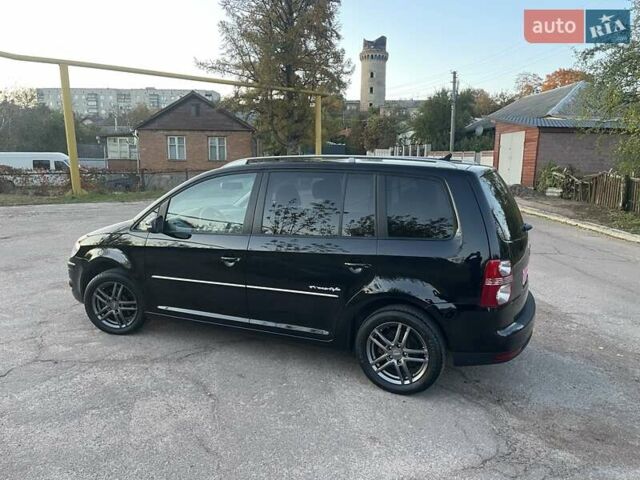 Черный Фольксваген Туран, объемом двигателя 1.4 л и пробегом 238 тыс. км за 7888 $, фото 79 на Automoto.ua