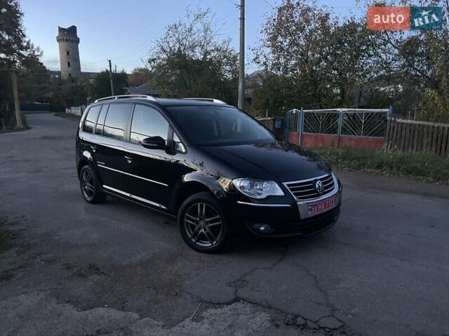 Черный Фольксваген Туран, объемом двигателя 1.4 л и пробегом 238 тыс. км за 7888 $, фото 3 на Automoto.ua