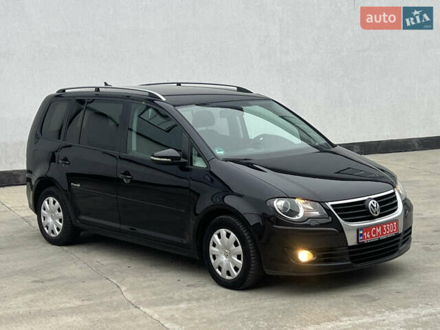 Черный Фольксваген Туран, объемом двигателя 1.4 л и пробегом 213 тыс. км за 8100 $, фото 30 на Automoto.ua