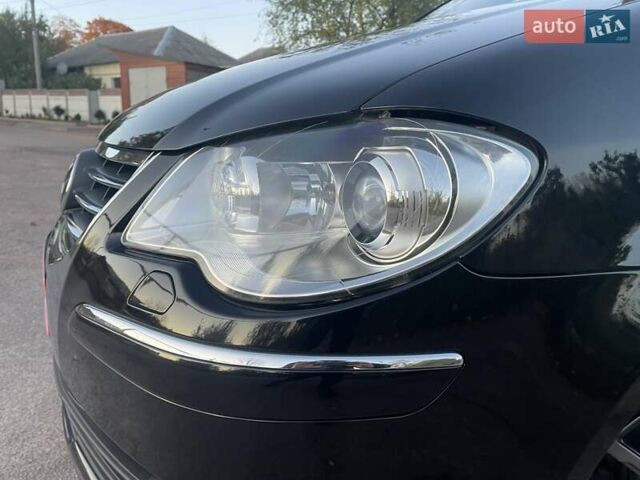 Черный Фольксваген Туран, объемом двигателя 1.4 л и пробегом 238 тыс. км за 7888 $, фото 19 на Automoto.ua