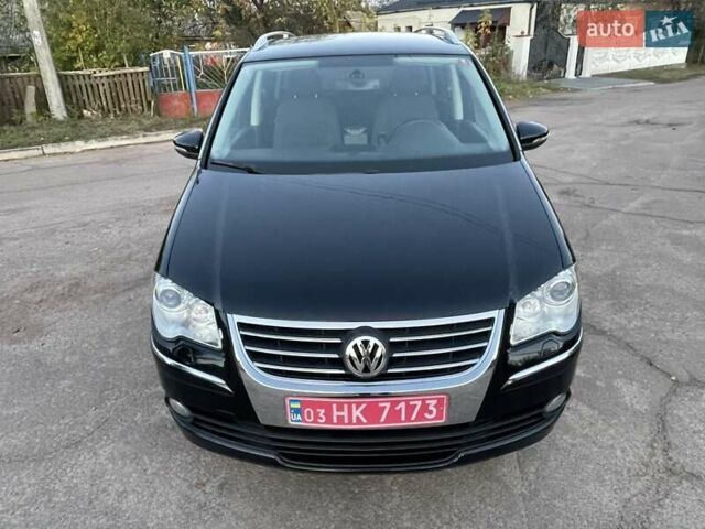 Черный Фольксваген Туран, объемом двигателя 1.4 л и пробегом 238 тыс. км за 7888 $, фото 17 на Automoto.ua