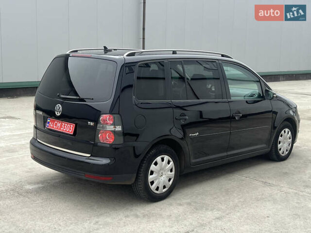 Черный Фольксваген Туран, объемом двигателя 1.4 л и пробегом 213 тыс. км за 8100 $, фото 25 на Automoto.ua