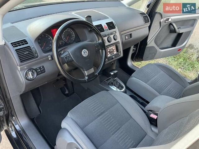 Черный Фольксваген Туран, объемом двигателя 1.4 л и пробегом 238 тыс. км за 7888 $, фото 62 на Automoto.ua