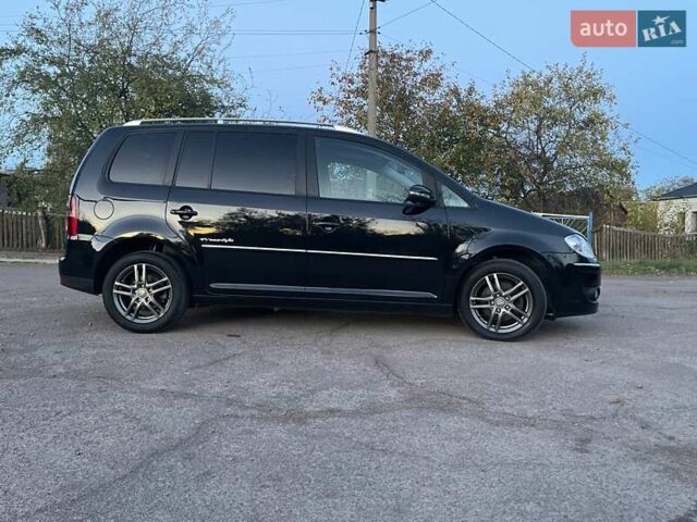 Черный Фольксваген Туран, объемом двигателя 1.4 л и пробегом 238 тыс. км за 7888 $, фото 200 на Automoto.ua