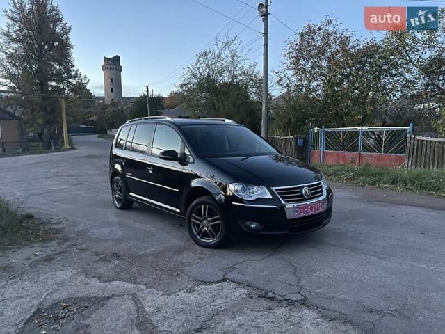 Черный Фольксваген Туран, объемом двигателя 1.4 л и пробегом 238 тыс. км за 7888 $, фото 5 на Automoto.ua