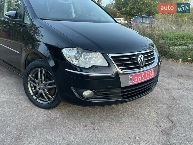 Черный Фольксваген Туран, объемом двигателя 1.4 л и пробегом 238 тыс. км за 7888 $, фото 92 на Automoto.ua