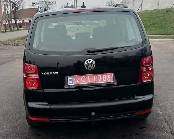 Черный Фольксваген Туран, объемом двигателя 1.6 л и пробегом 249 тыс. км за 7999 $, фото 17 на Automoto.ua