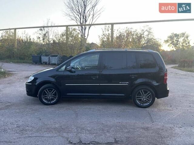 Черный Фольксваген Туран, объемом двигателя 1.4 л и пробегом 238 тыс. км за 7888 $, фото 114 на Automoto.ua