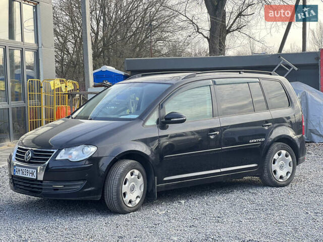 Черный Фольксваген Туран, объемом двигателя 1.4 л и пробегом 290 тыс. км за 6900 $, фото 1 на Automoto.ua