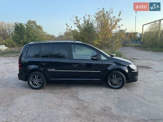 Черный Фольксваген Туран, объемом двигателя 1.4 л и пробегом 238 тыс. км за 7888 $, фото 97 на Automoto.ua