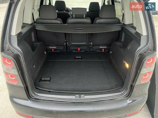 Черный Фольксваген Туран, объемом двигателя 1.4 л и пробегом 213 тыс. км за 7950 $, фото 37 на Automoto.ua