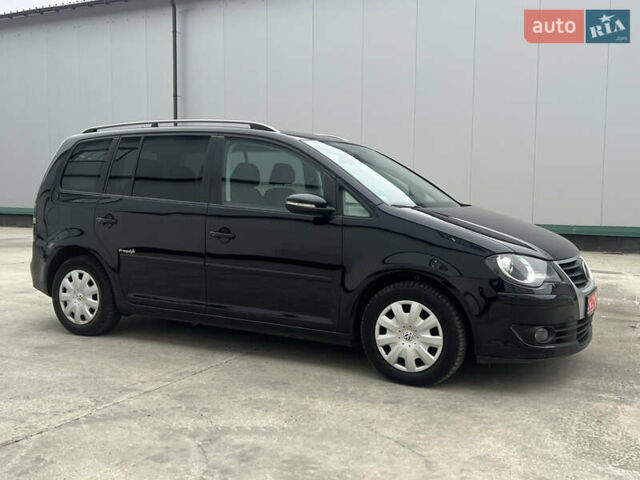 Черный Фольксваген Туран, объемом двигателя 1.4 л и пробегом 213 тыс. км за 8100 $, фото 90 на Automoto.ua