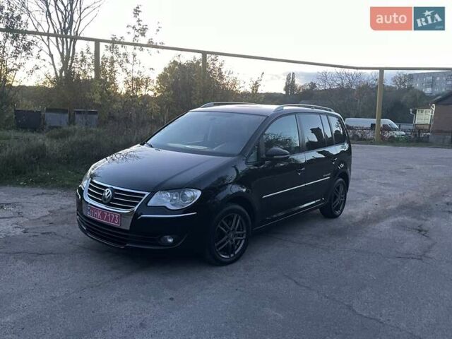 Черный Фольксваген Туран, объемом двигателя 1.4 л и пробегом 238 тыс. км за 7888 $, фото 10 на Automoto.ua