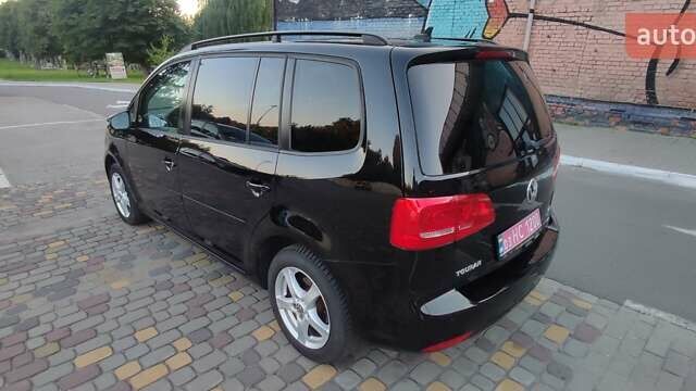 Чорний Фольксваген Туран, об'ємом двигуна 1.6 л та пробігом 258 тис. км за 10700 $, фото 6 на Automoto.ua