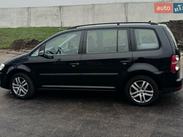 Черный Фольксваген Туран, объемом двигателя 1.6 л и пробегом 249 тыс. км за 7999 $, фото 11 на Automoto.ua